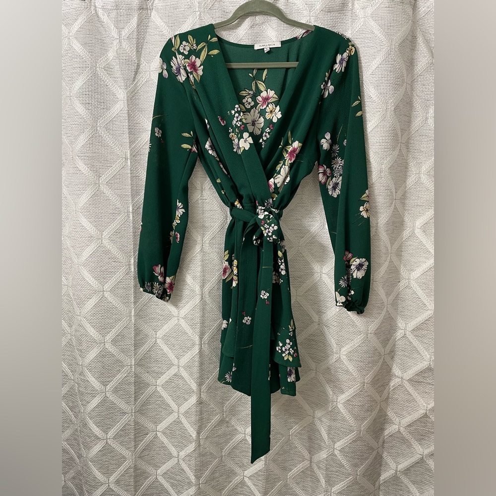 Romantic faux wrap mini dress with 3/4 length sleeves